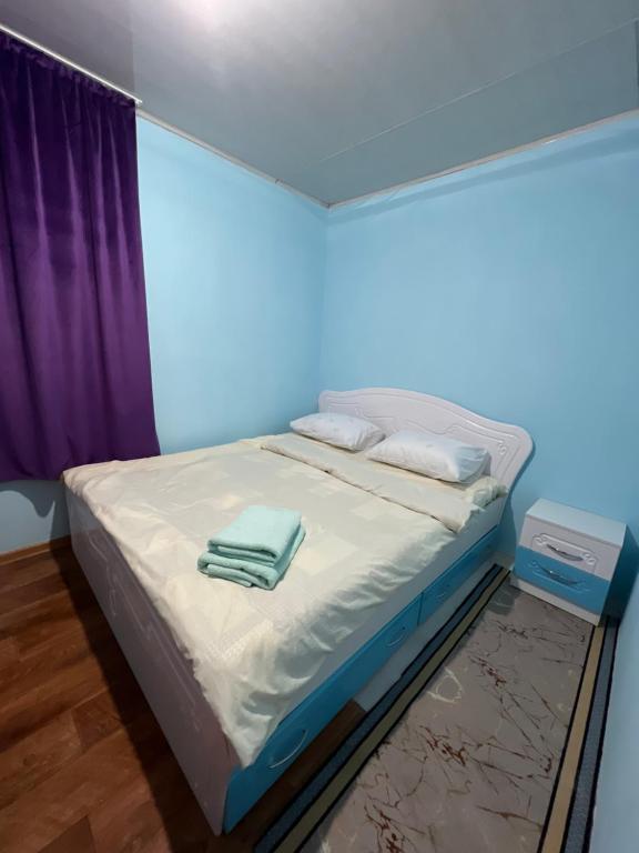 Postel nebo postele na pokoji v ubytování Mini hotel