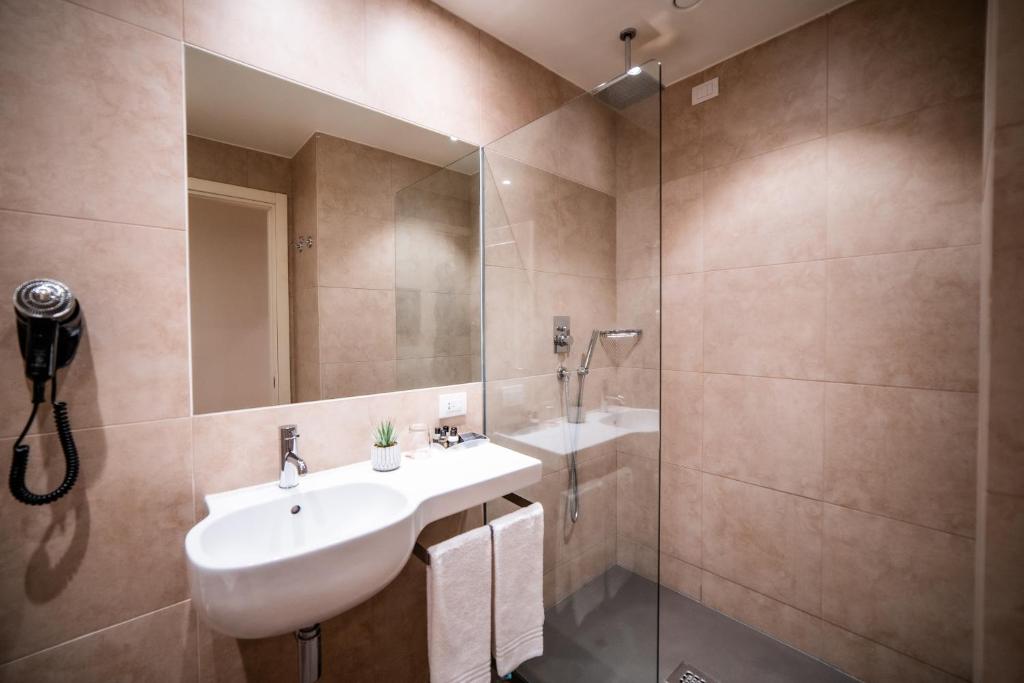 Koupelna v ubytování Hotel Capolago