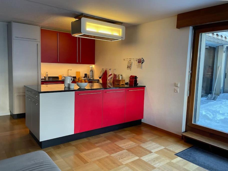 Kuchyň nebo kuchyňský kout v ubytování Titlis Lodge Engelberg