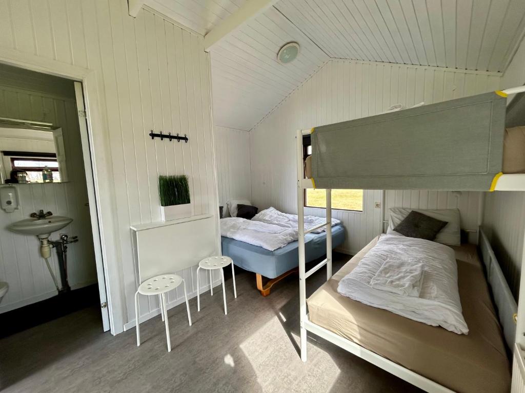 Letto o letti in una camera di Arhus Cottage and Camping