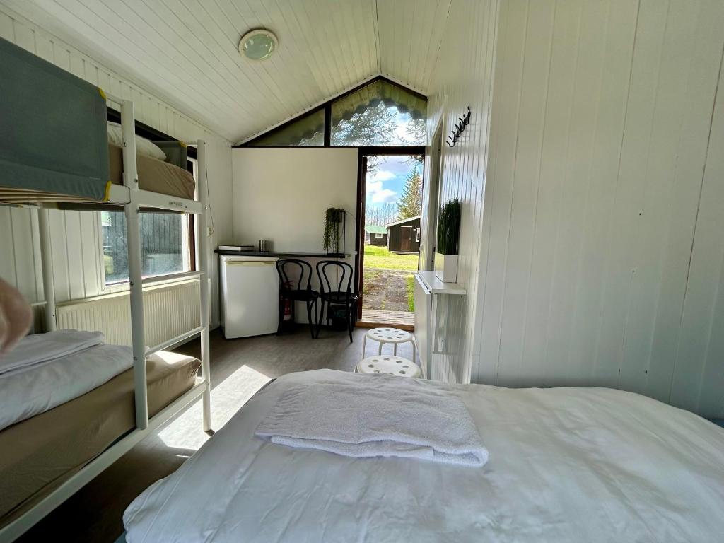 Letto o letti in una camera di Arhus Cottage and Camping