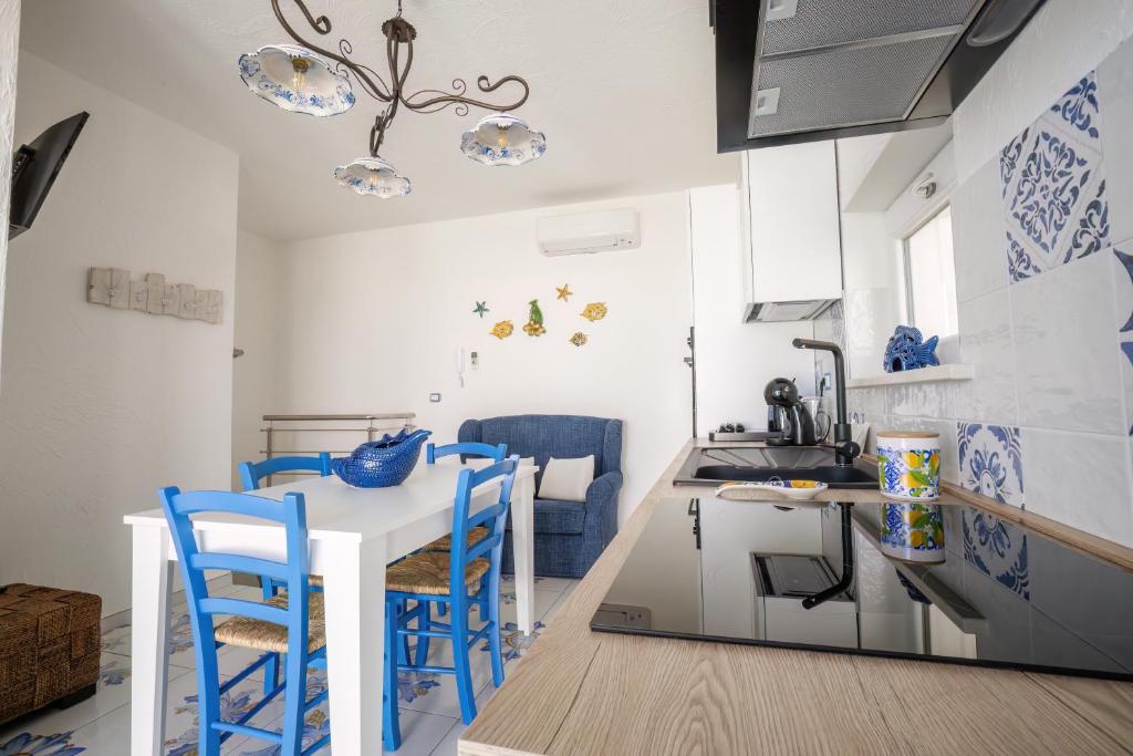 Kuchyň nebo kuchyňský kout v ubytování Étoiles Guest House