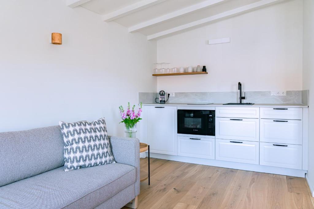 Kuchyň nebo kuchyňský kout v ubytování Kapitänshaus Friedrich Franz - Premium Apartments 200 Meter vom Strand und Alten Strom