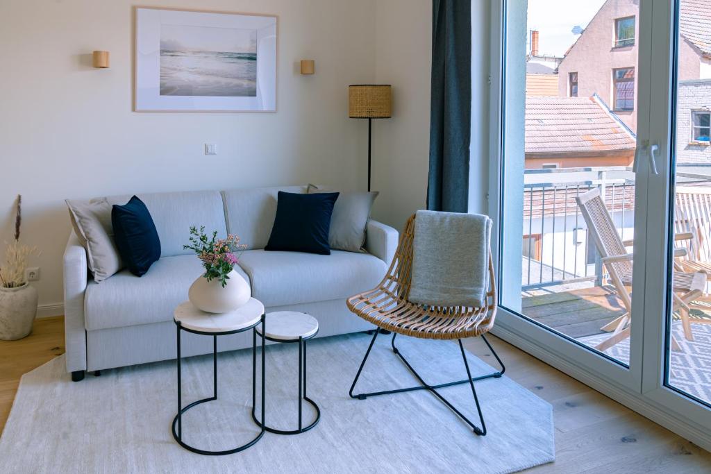Posezení v ubytování Kapitänshaus Friedrich Franz - Premium Apartments 200 Meter vom Strand und Alten Strom