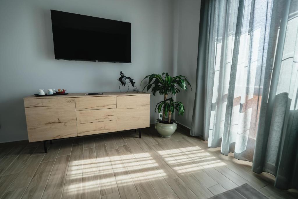 TV a/nebo společenská místnost v ubytování B&B La Perla