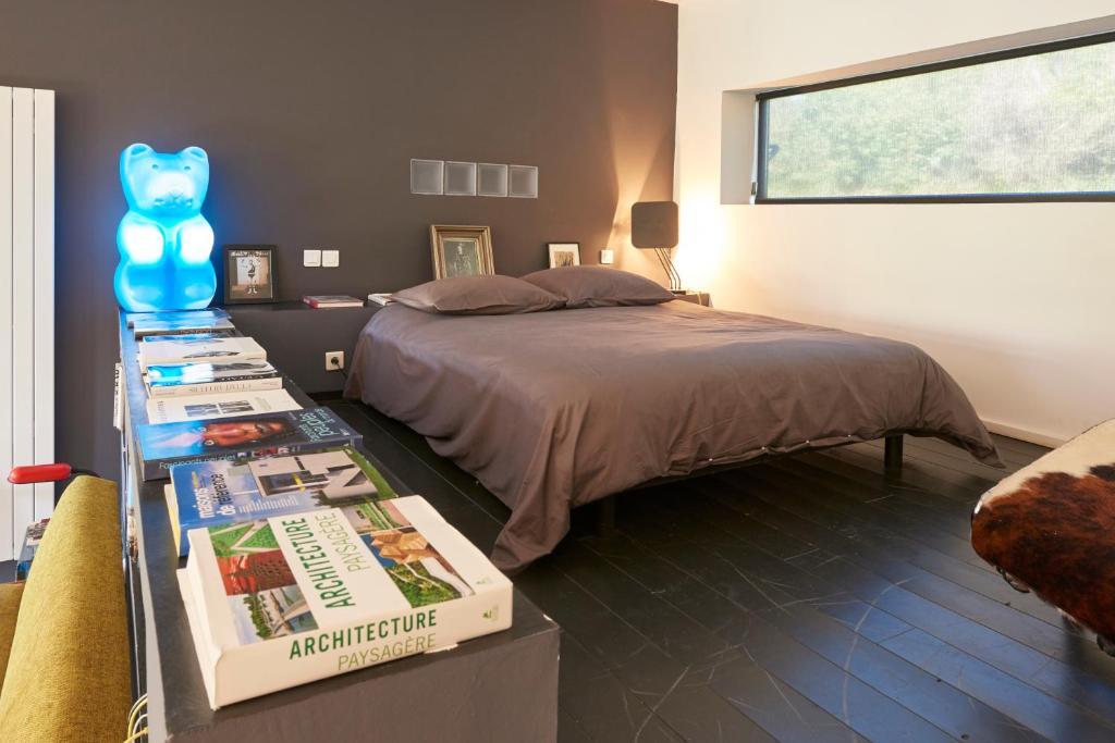 Postel nebo postele na pokoji v ubytování Un soir d'été - Chambres d'hôtes
