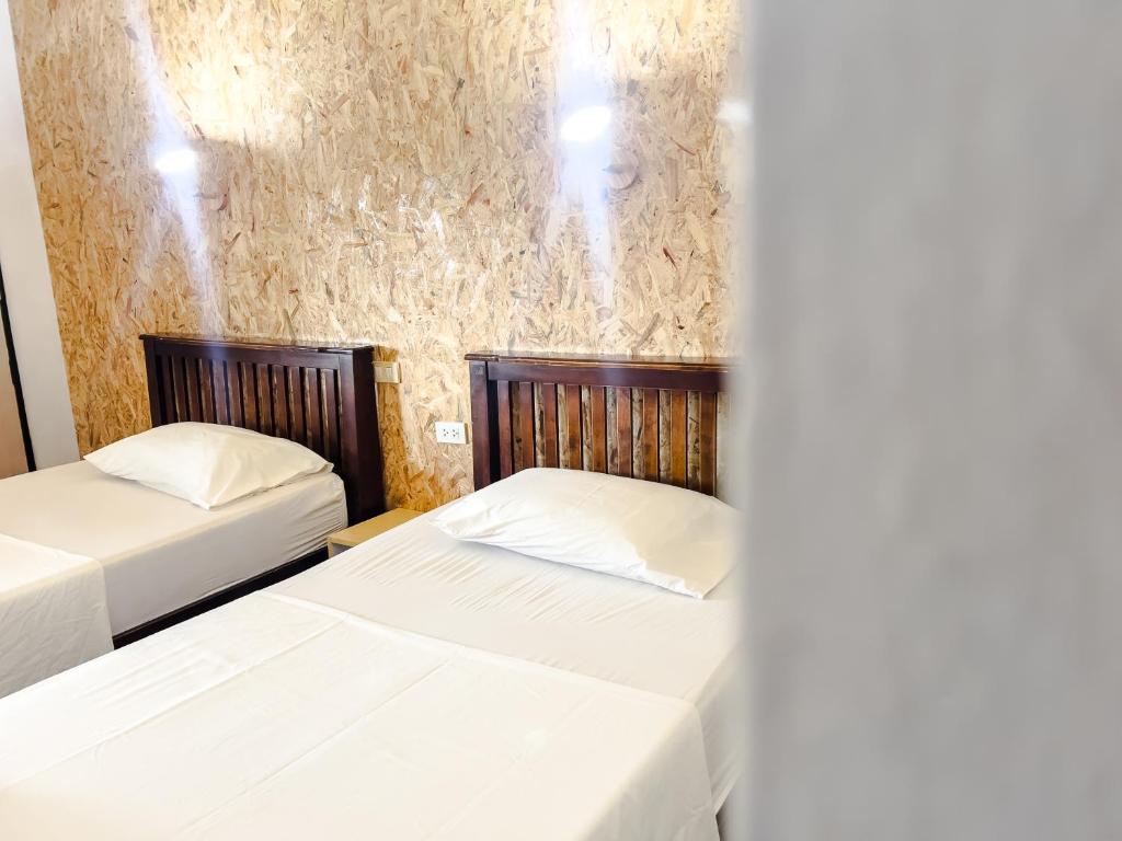Postel nebo postele na pokoji v ubytování Lux Guesthouse