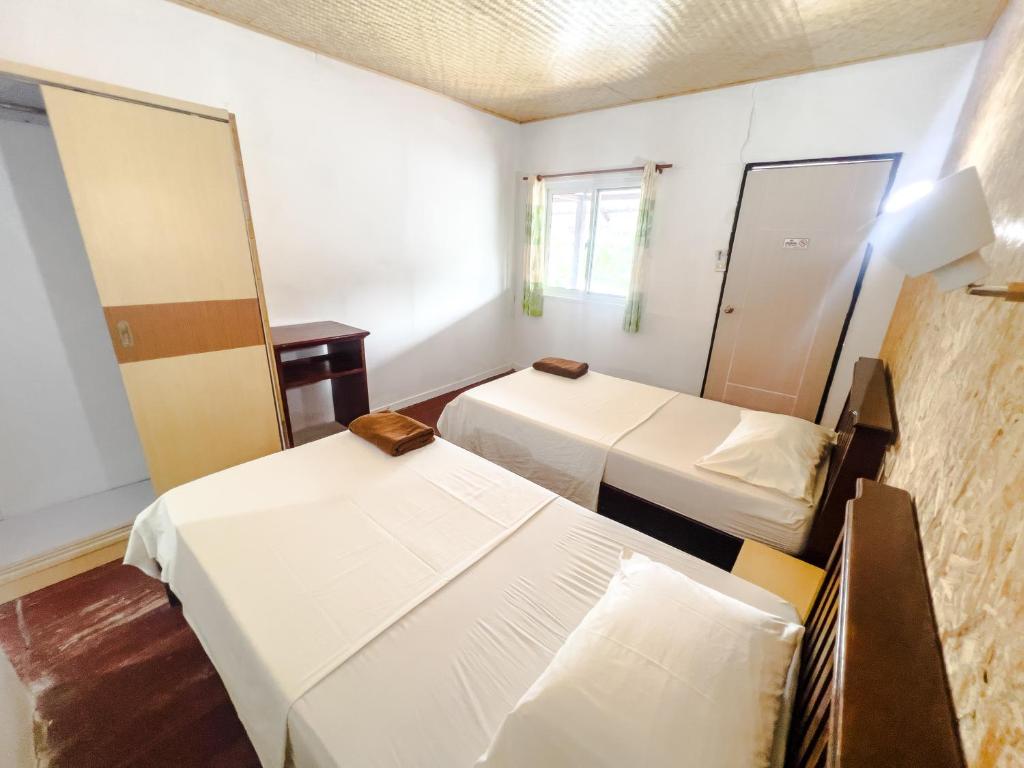 Postel nebo postele na pokoji v ubytování Lux Guesthouse