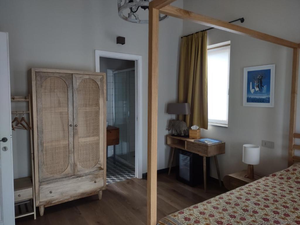 Postel nebo postele na pokoji v ubytování Villa Sarita