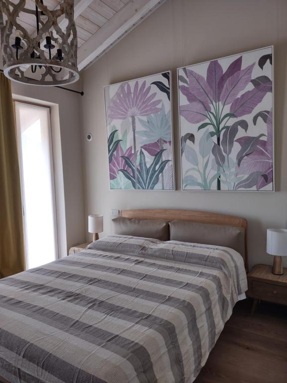 Postel nebo postele na pokoji v ubytování Villa Sarita