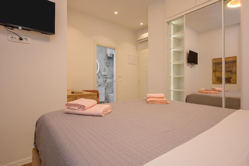 Postel nebo postele na pokoji v ubytování Jupiter Luxury Accommodation