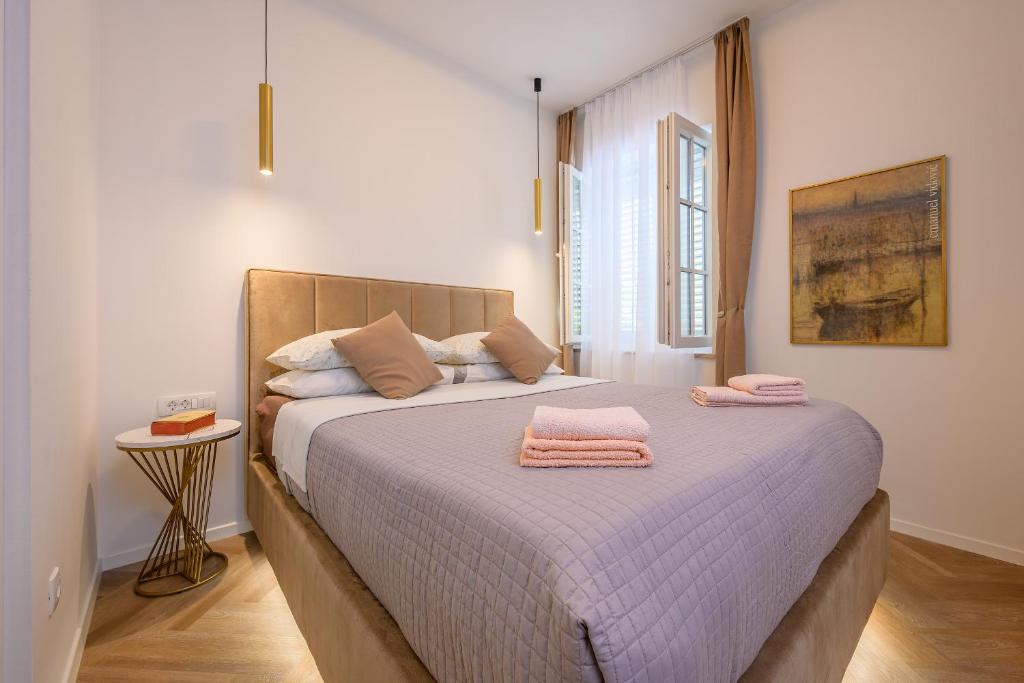 Postel nebo postele na pokoji v ubytování Jupiter Luxury Accommodation