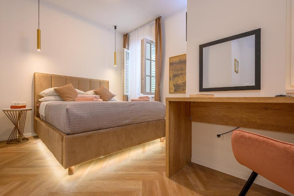 Postel nebo postele na pokoji v ubytování Jupiter Luxury Accommodation