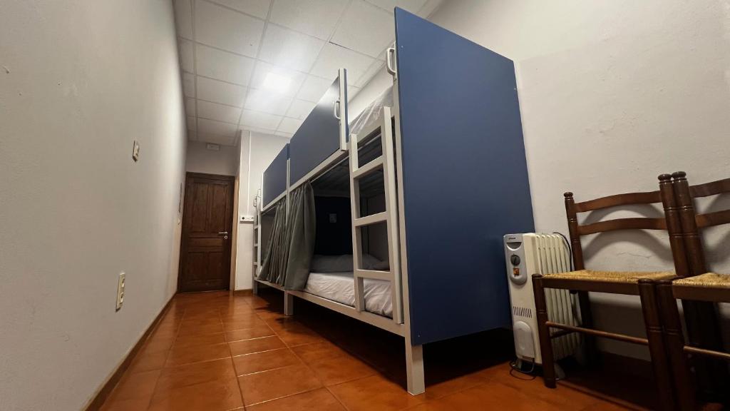Postel nebo postele na pokoji v ubytování Albergue La Estación