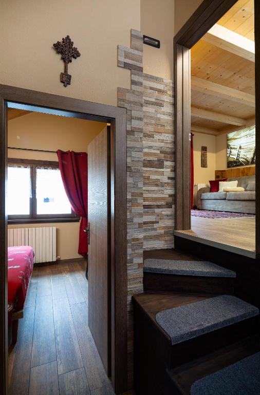 Postel nebo postele na pokoji v ubytování Chalet Da Florin