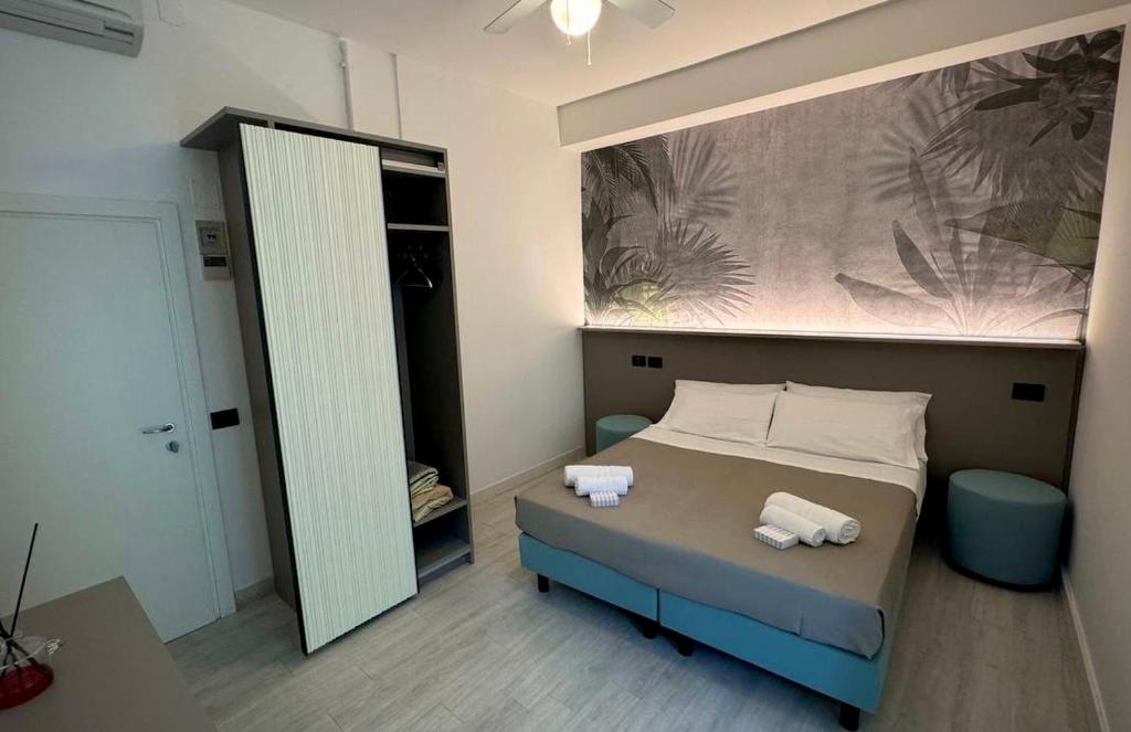 Postel nebo postele na pokoji v ubytování Hotel Eden B&B
