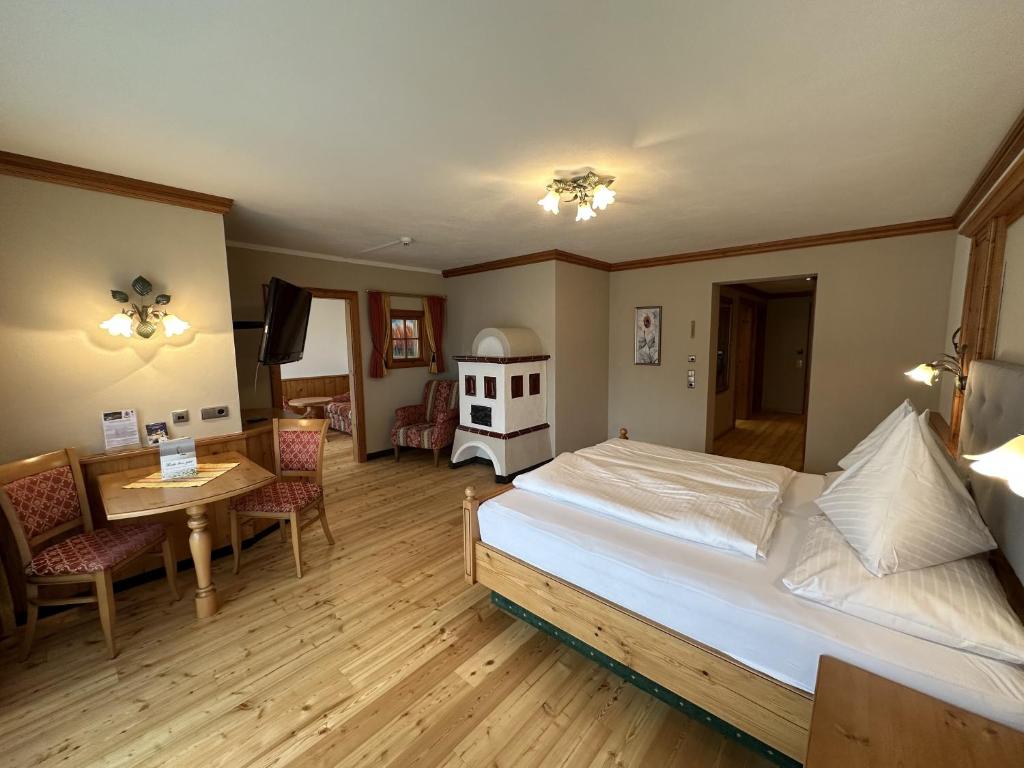 Postel nebo postele na pokoji v ubytování Hotel Das Urbisgut