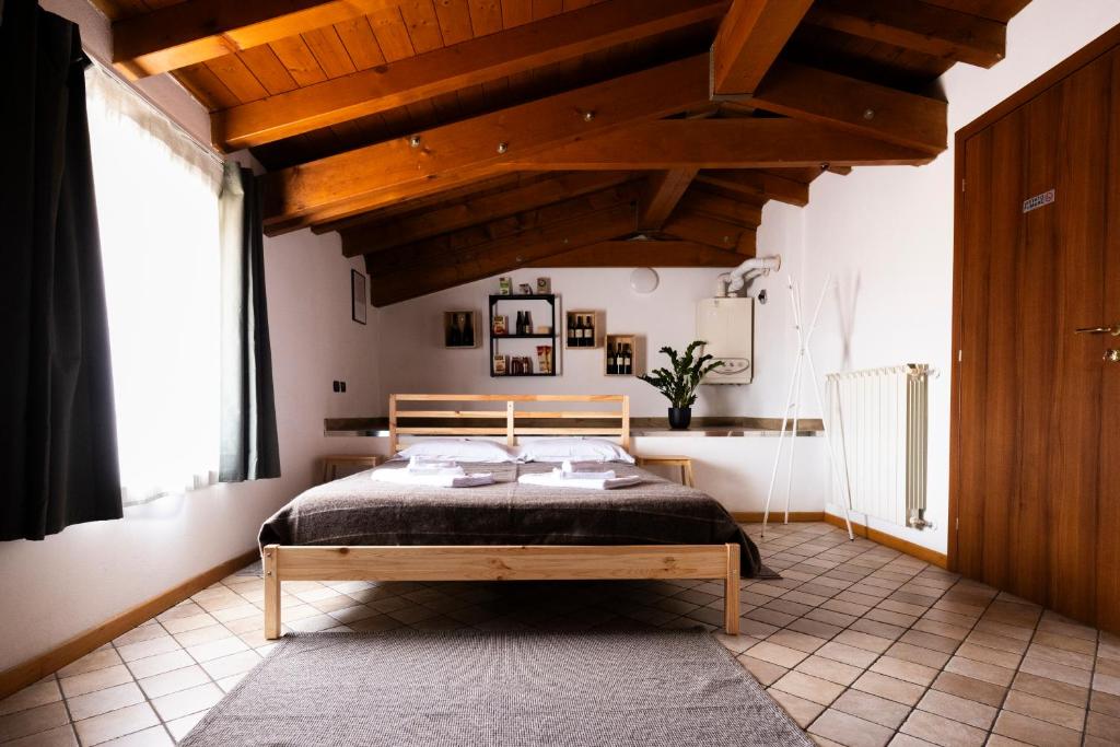 Ліжко або ліжка в номері Traditional Italian House - Franciacorta