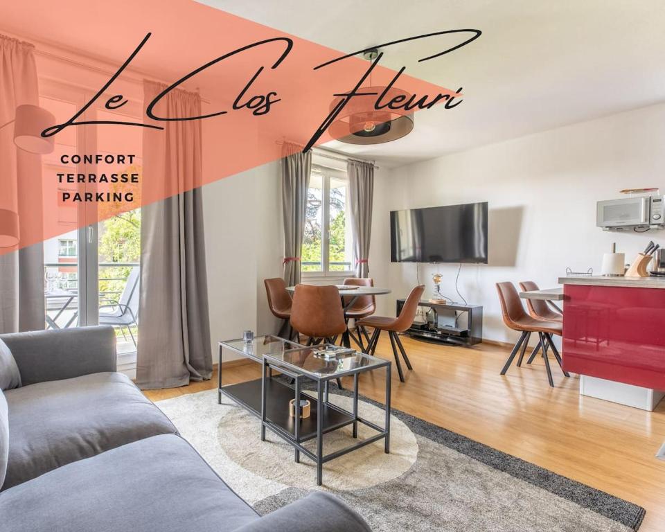 Μια τηλεόραση ή/και κέντρο ψυχαγωγίας στο Le Clos Fleuri F3 Terrasse & Garage