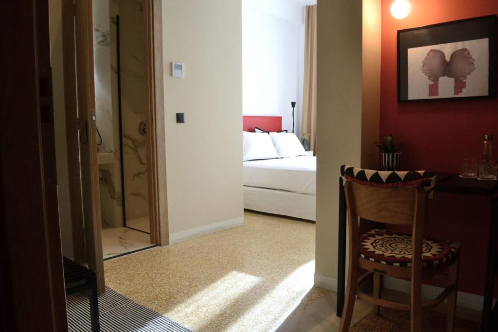 Postel nebo postele na pokoji v ubytování Anasa Hotel Athens