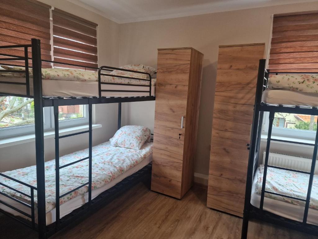 Postel nebo postele na pokoji v ubytování Natali