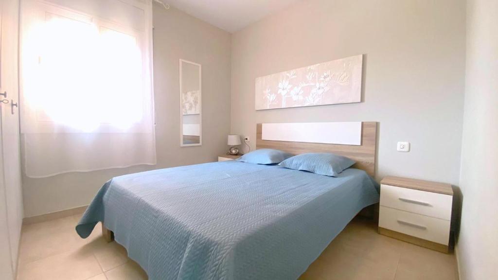 A bed or beds in a room at OLIMPE 2 8