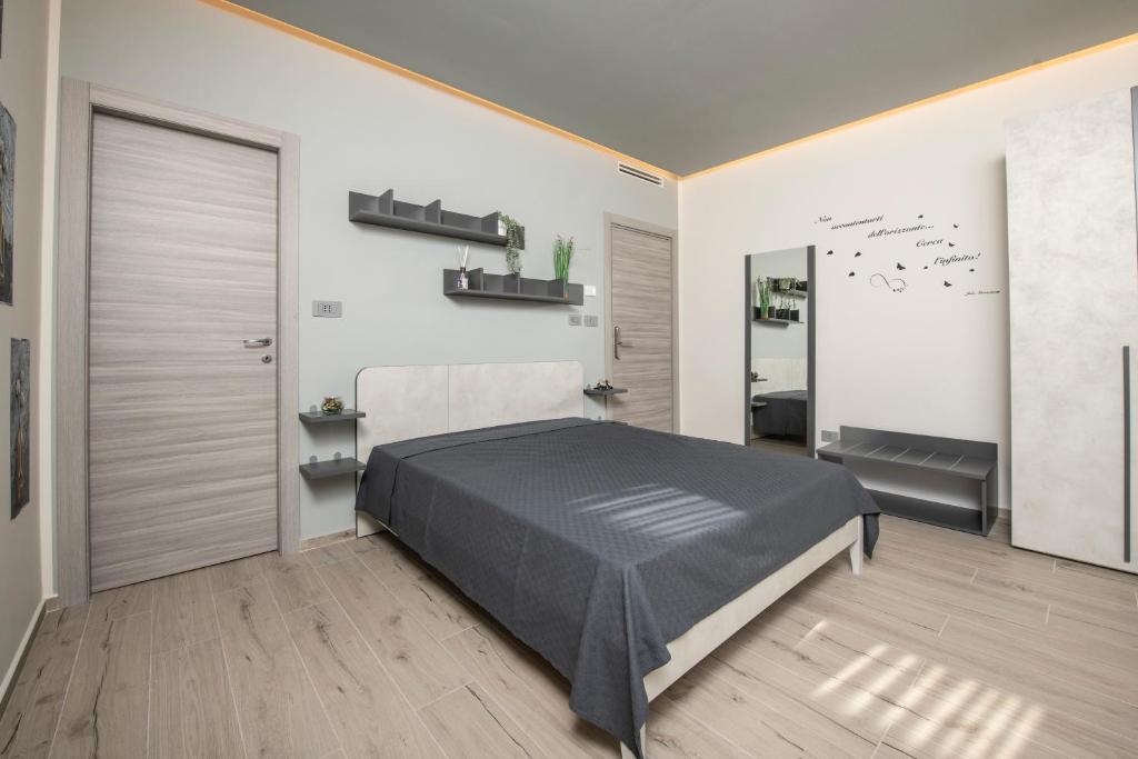 Postel nebo postele na pokoji v ubytování 241 - Camera Nord Est - Affittacamere Sara Home Chiavari, 200Metri dal Mare