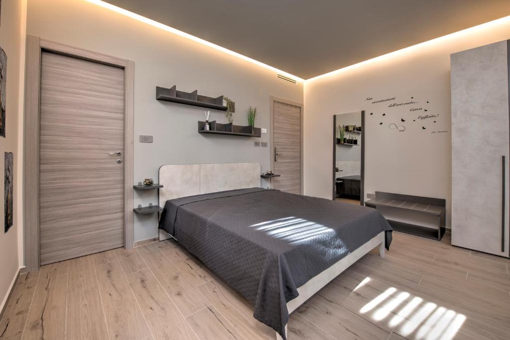 Postel nebo postele na pokoji v ubytování 241 - Camera Nord Est - Affittacamere Sara Home Chiavari, 200Metri dal Mare