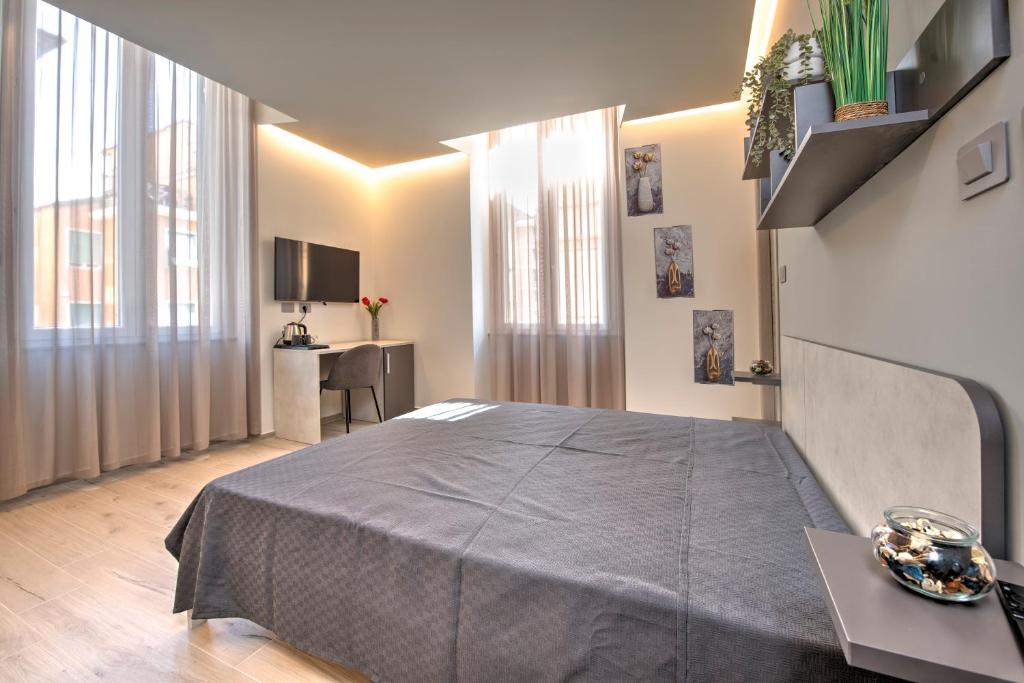 Postel nebo postele na pokoji v ubytování 241 - Camera Nord Est - Affittacamere Sara Home Chiavari, 200Metri dal Mare
