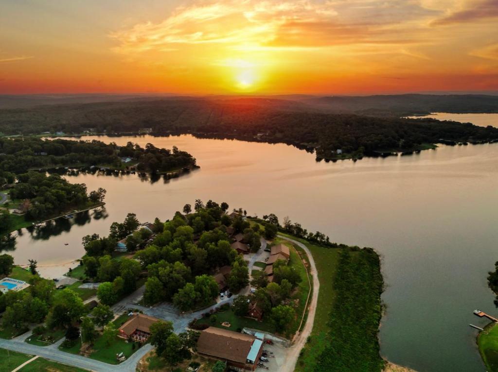 an aerial view of a lake at sunset at Crown Lake Resort & RV in Horseshoe Bend