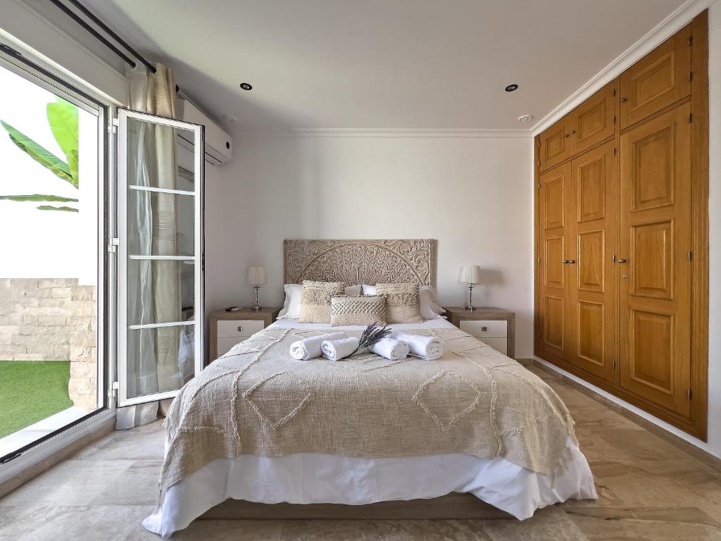 Posteľ alebo postele v izbe v ubytovaní Studio Novena Little Apartments