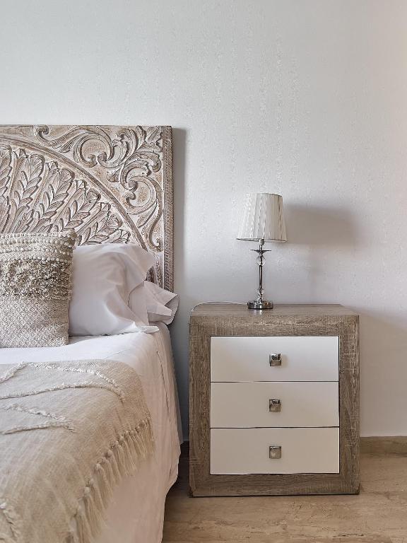 Posteľ alebo postele v izbe v ubytovaní Studio Novena Little Apartments
