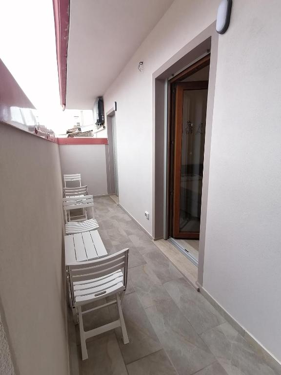 Fotografie z fotogalerie ubytování CLASS ROOMS AFFITTACAMERE v destinaci SantʼAnna Arresi