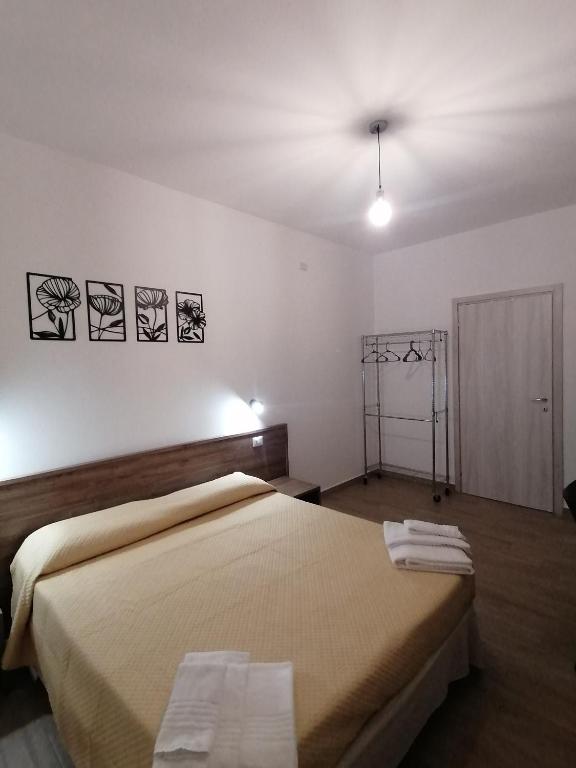 Postel nebo postele na pokoji v ubytování CLASS ROOMS AFFITTACAMERE