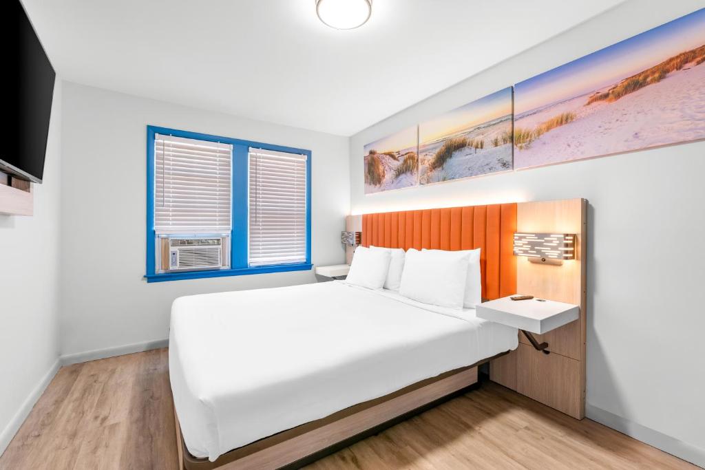 Postel nebo postele na pokoji v ubytování Buttercup Suites Wildwood Crest Beach