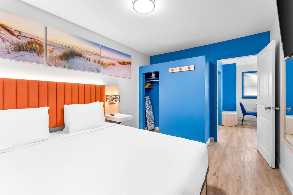 Postel nebo postele na pokoji v ubytování Buttercup Suites Wildwood Crest Beach