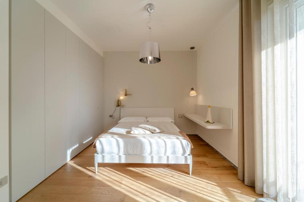 Postel nebo postele na pokoji v ubytování Kalì Tribe Home