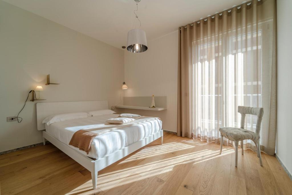 Postel nebo postele na pokoji v ubytování Kalì Tribe Home