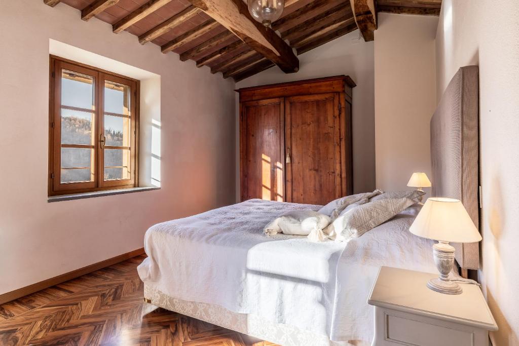 Postel nebo postele na pokoji v ubytování Casa Bachella