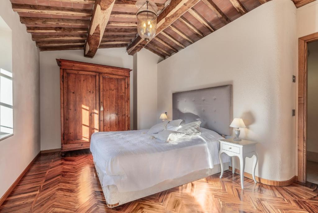 Postel nebo postele na pokoji v ubytování Casa Bachella