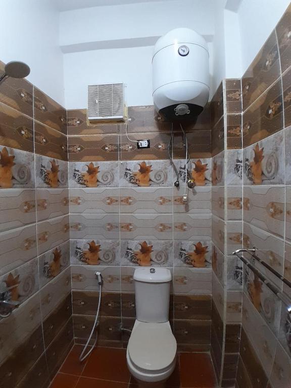 Koupelna v ubytování Osiris Guest House