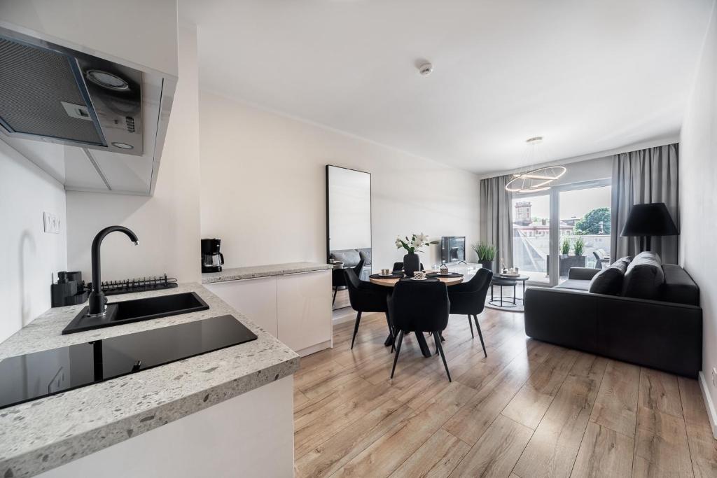 Η κουζίνα ή μικρή κουζίνα στο Wyspa Uznam Marina Jachtowa