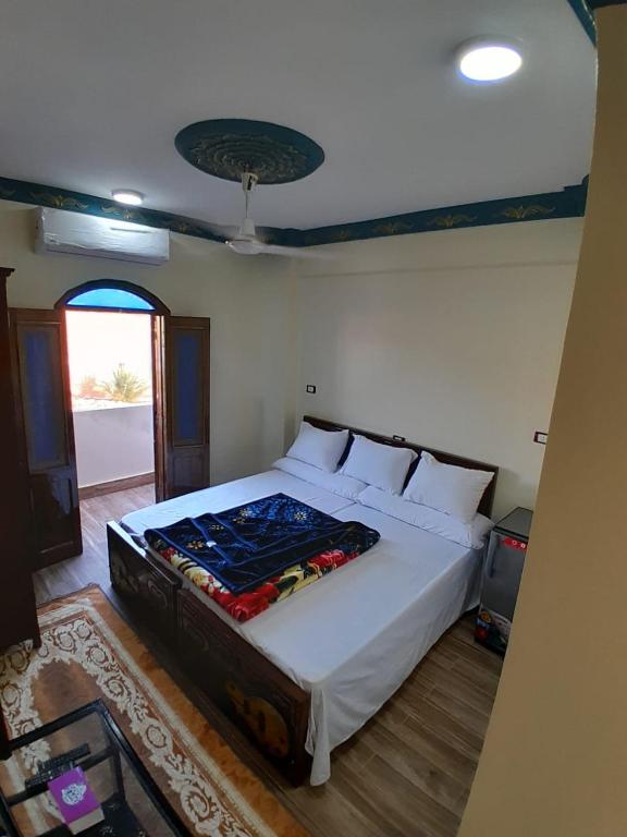 Postel nebo postele na pokoji v ubytování Osiris Guest House