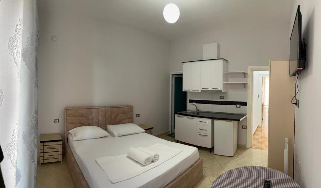 Kuchyň nebo kuchyňský kout v ubytování Hotel Vila Flowers