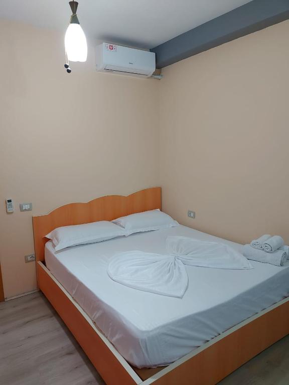 Rúm í herbergi á Vila Green Relax