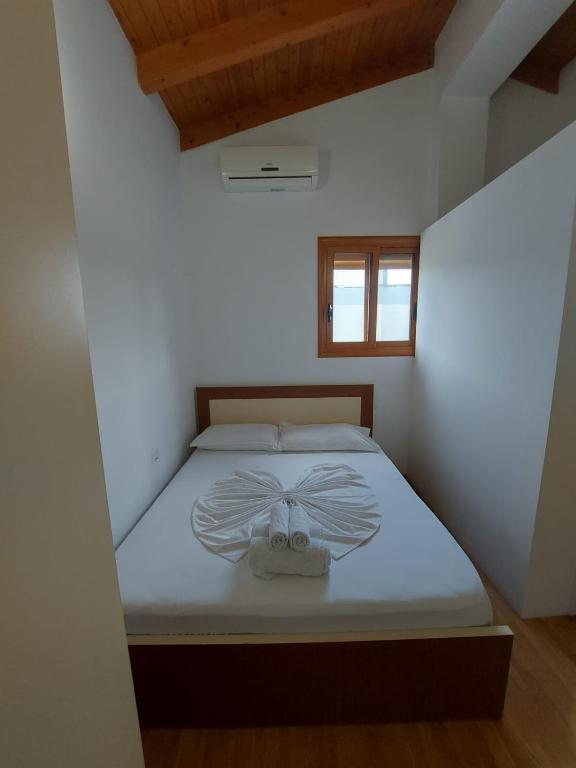 Rúm í herbergi á Vila Green Relax