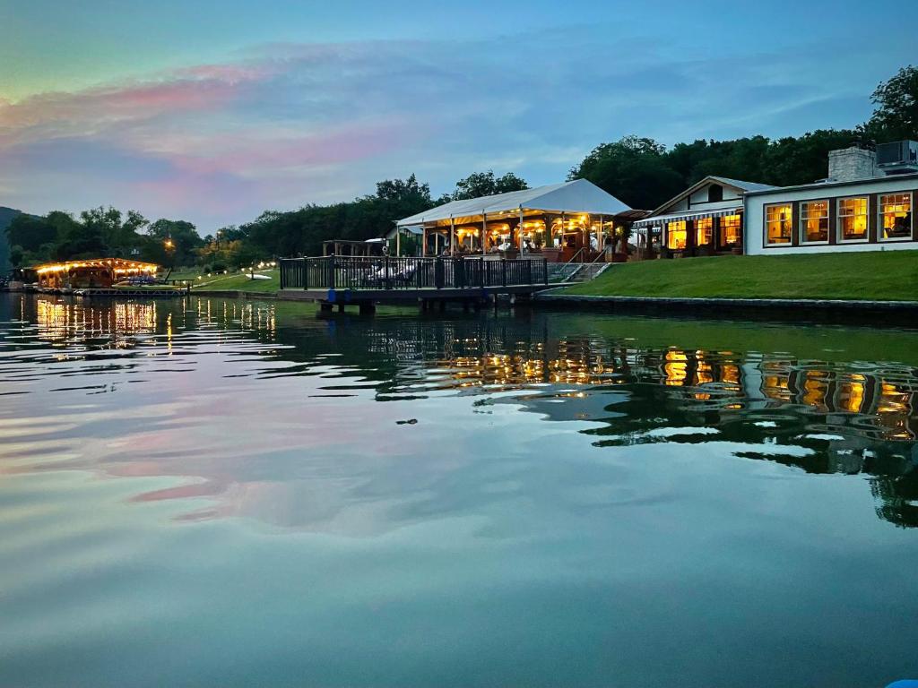 a restaurant next to a body of water at Lake Austin Spa Resort - All Inclusive in Austin