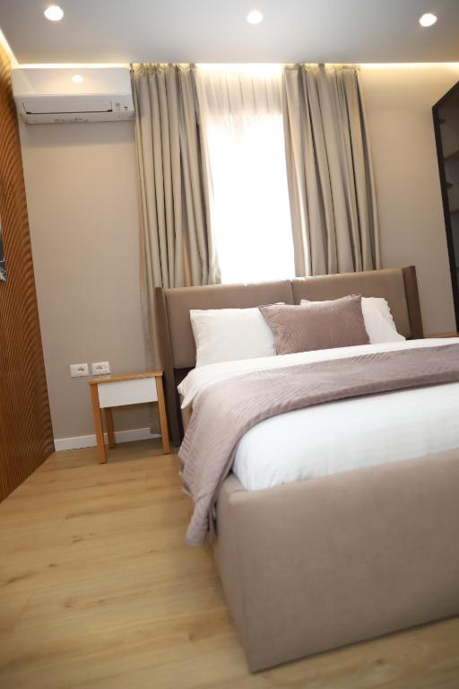 Postel nebo postele na pokoji v ubytování J&D Rooms Korce