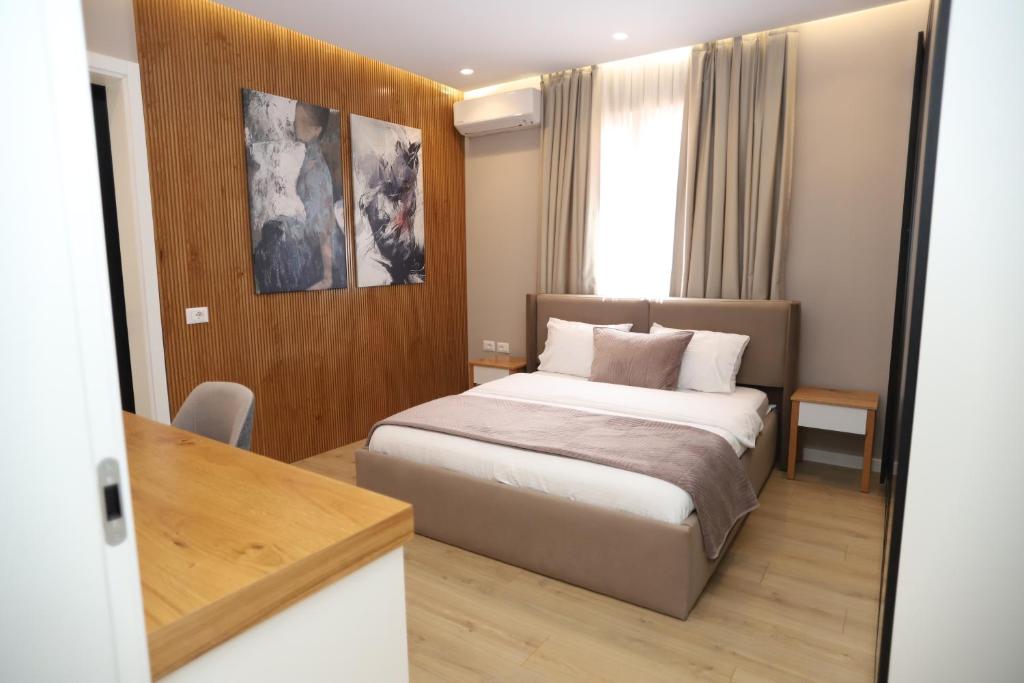 Postel nebo postele na pokoji v ubytování J&D Rooms Korce