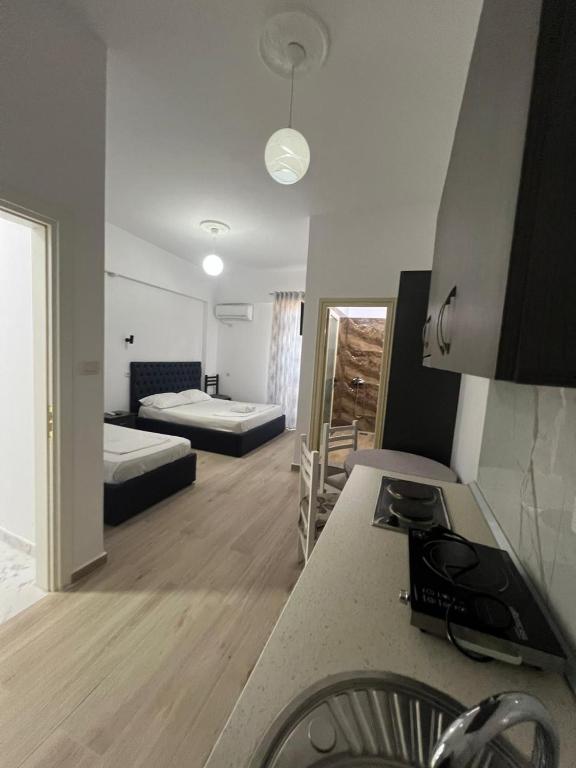 Postel nebo postele na pokoji v ubytování Hotel Vila Flowers